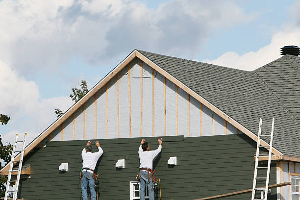 Professional Vinyl Siding technician working in La Belle, PA